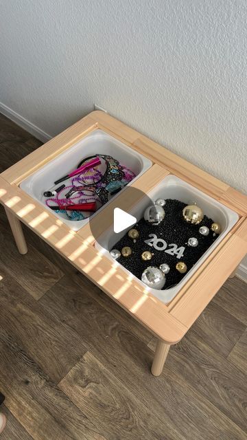 Julianna Simmons on Instagram: "I couldn’t leave y’all hanging without a sensory bin idea for new years bc I know many of you will be staying home with your littles like we will be. 

This bin touches 3 out of the 5 senses: Sight, Touch, & Sound for some great imaginative play! Let me know if you try it out. I sourced most of these items from the Target dollar spot and party city! I will also have it linked on my ltk 

sensory bin ideas, new years, new years with kids, new year sensory bin" New Years Sensory Bin, New Year Sensory Bin, New Years With Kids, The 5 Senses, Sensory Bin Ideas, Target Dollar Spot, Sensory Ideas, 5 Senses, Daycare Crafts