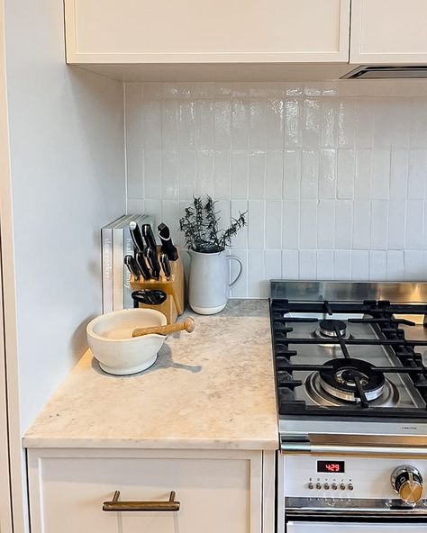 @kintirrabinhouse have created the most beautiful family kitchen. I’m loving all the textures and that oven !!! They picked our Noosa in white tile in a vertical stack as the splashback tile and it looks amazing 😻 White Vertical Tiles Kitchen, Vertical Splashback Tiles, 3x12 Subway Tile Backsplash Kitchen Stacked, Oven Range Tiled Splashback, White Tile Splashback, Kitchen Tiling, Topps Tiles Zellica Antique White, Splashback Kitchen, Kitchen Splashback Tiles