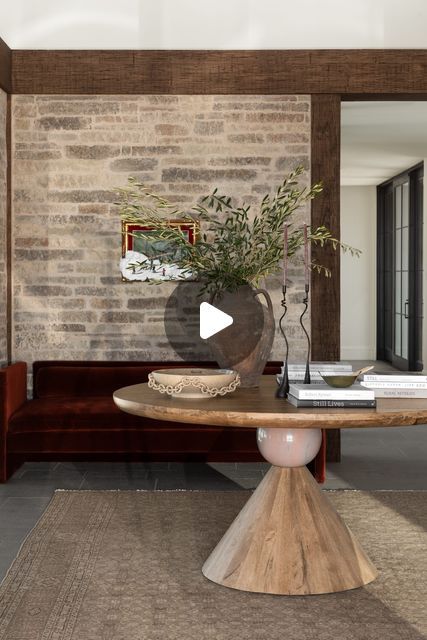 Studio McGee on Instagram: "To add warmth and texture to this entryway in #SMSummitEstate, we carried the exterior stone on several of the interior walls and added a timber detail that lowered the line of sight, creating a cozy feel. More on YouTube!" Exterior Stone, Studio Mcgee, Interior Walls, The Line, Entryway, Dining Room, Exterior, Texture, Stone