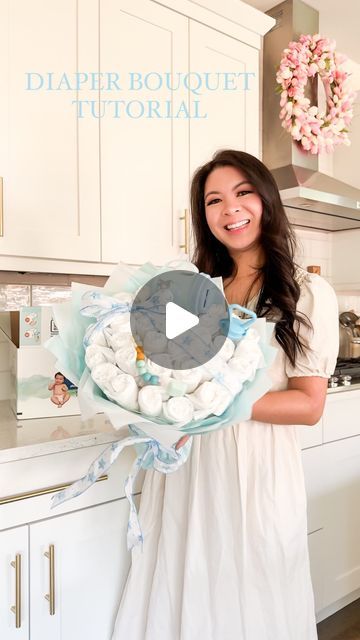 Tina | Seattle Blogger on Instagram: "DIAPER BOUQUET TUTORIAL 👶🏻💐 Had so much fun making this diaper bouquet and I absolutely love how it turned out!!! It’s easier and less time consuming than a diaper cake too! Comment SHOP to get a list of supplies needed to recreate this or go to my Amazon page under Crafts! #diaperbouquet #babygift #diybouquet" How To Make A Nappy Cake, Diaper Stroller Diy How To Make, Diaper Tower Ideas, Diaper Flowers Bouquet, Teddy Bear Diaper Cake Tutorial, Baby Shower Diaper Bouquet, How To Make A Diaper Bouquet, Diaper Crafts For Baby Shower Diy, How To Make A Diaper Cake For Baby Boy