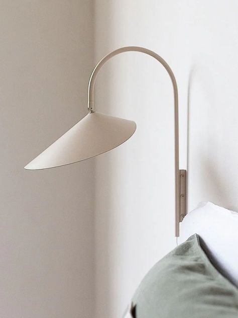 The petal-like shade of our Arum Wall Lamp emits a soft, diffused light perfect for adding cosy ambience to a home. Suspended from a slender powder coated metal frame, it attaches to a wall with a bracket, and the shade can be tilted to the perfect angle. Bedside Lights, Bedside Wall Lamp, Black Wall Lamps, Diffused Light, Wall Lamp, Metal Frame, Frame, Wall, Design