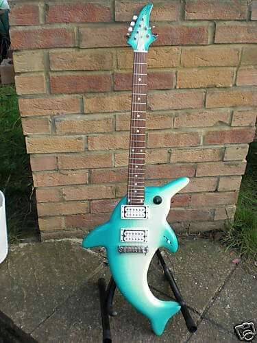 #Flipper #Dolphin #Guitar #Japan Cursed Guitar, Guitar Design Ideas, Funny Guitar, Walpapers Cute, Instruments Art, Electric Guitar Design, Guitar Obsession, Unique Guitars, Cool Electric Guitars