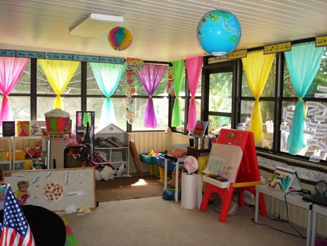 Our classroom....needs more candy for the "candy land " feel, but the curtains give a good start. Curtains are made from plastic table cloths held up with simple tension rods!! Classroom Window Decorations, Candy Theme Classroom, Classroom Curtains, Classroom Window, Curtain Tracks, Classroom Layout, New Classroom, Class Decoration, Classroom Setup