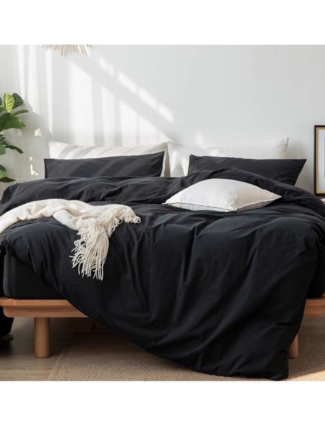 Elevate your bedroom with this sleek black bedding set, tailored to fit a king-size bed with dimensions of 104"x90". Made from 100% washed cotton, this set promises a comfortable and breathable experience, ideal for all seasons. The set includes a duvet cover and two pillow shams, featuring a solid pattern that complements a casual style. With a high thread count of 1200, the durable duvet set is designed for ease of care, sporting a convenient zipper closure for effortless maintenance. It's lightweight and boasts a textured feel, ensuring a pleasant touch against your skin. The set is machine washable, retaining its quality without the need for bleach. Black Bed Set, Bath Pictures, King Home, King Duvet Cover Sets, Bedding Duvet, Black Bedding, Duvet Bedding, King Duvet Cover, King Duvet