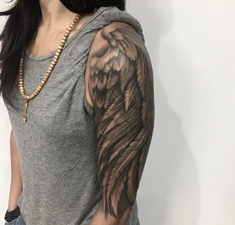 grey-top-wooden-necklace-white-background-arm-tattoo-small-angel-wings-tattoo-woman-with-black-hair Wings Tattoo Shoulder, Cover Arm Tattoo, Angel Wings Tattoo Shoulder, Wing Tattoo Arm, Wing Neck Tattoo, Beautiful Angel Tattoos, Wing Tattoos On Back, Wings Of Angels, Wing Tattoos