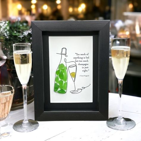 Sea Glass Art Bar Decor| Champagne Cocktail Quote Seaglass Gift| Framed Art This Listing Includes: *Beautiful Sea Glass Art As Pictured *Genuine Sea Glass Used In Each Piece *Perfect Gift For A Birthday Or Holiday! *Minimalist Design Printed On Card Stock Paper With Sea Glass Attached * High Quality 5x7 Compostite Shadowbox Frame *Real Glass Front *Frame Available In Wood Grain, White Or Black *Bevel Cut Mat *Frame Depth Is 1.5 Inches And Stands Alone Or Can Be Hung *Note Included About The Hist Sea Glass Cocktail Art, Holiday Minimalist, Cocktail Quotes, Sea Glass Art Diy, Sea Glass Art Projects, Seaglass Art, Beach Glass Crafts, Champagne Gift, Glass Art Projects