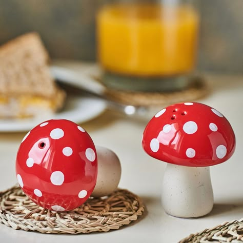 These hand painted mushroom salt & pepper shakers will give every dining table an original touch.     Crafted from ceramic to create our mushroom design.     Featuring a colourway of soft white, cream and red.     A wonderful and affordable gift or a great addition to your collection of kitchen accessories. Dimensions W 6.00 x L 6.00 x H 7.50 cm Made from Ceramic Mushroom Salt And Pepper Shakers, Mushroom Kitchen Theme, Mushroom Ceramics Ideas, Red Mushroom Art, Engineering Inspiration, Mushroom Kitchen Decor, Mushroom Things, Cute Salt And Pepper Shakers, Mushroom Room