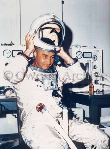 Astronaut Virgil I. Grissom takes off his helmet prior to the first manned altitude test Astronaut Poses Reference, Helmet Pose Reference, Taking Off Helmet Pose Reference, Astronaut Reference, Taking Off Helmet Pose, Astronaut Helmet Reference, Astronaut Helmet Design, Astronaut Photography, Astronaut Looking Up