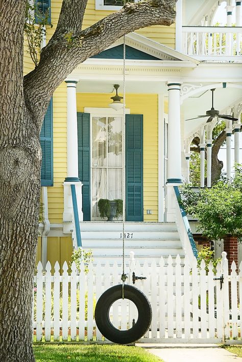 quintessential yellow country house with a white picket fence and accents. lets not forget the tree swing! Yellow House Exterior, Ideas Terraza, Window Shutters Exterior, Colors For House, Paint Colors For House, Shutter Colors, Best Exterior Paint, House Paint Color Combination, House Shutters