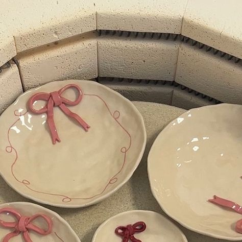 Myo Studio on Instagram: "bow dishes 🎀 available on dec 12th at 3 pm cet! i’m so grateful for the love on these dishes, so please note i will restock them in late december and january too ❄️" Bow Jewelry Dish, Clay Plates Ideas, Food Ceramics, Plate For Jewelry, Diy Jewellery Dish, Clay Dishes, Homemade Bows, Clay Plates, Clay Crafts Air Dry