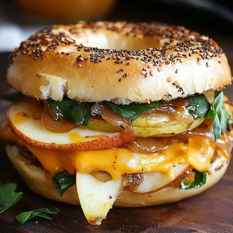 Caramelized Onion Grilled Cheese, Cheese Bagel Sandwich, Cheddar Bagels, Caramalized Onions, Onion Bagel, Onion Grilled Cheese, Apple Cheddar, Apple Sandwich, Bagel Toppings