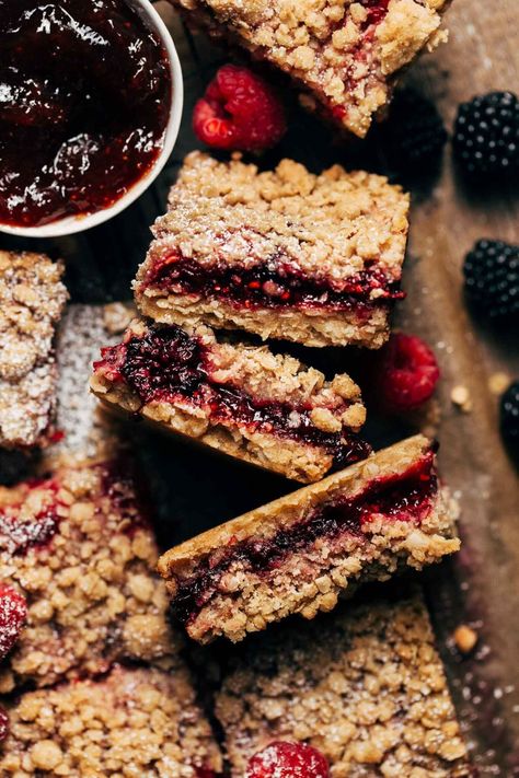 These sweet berry crumble bars are deliciously sweet with a tart jammy filling. Made with a brown sugar crumble and a triple berry filling, these bars are the perfect treat for berry season! #crumblebars #berrycrumble #raspberrycrumblebars #butternutbakery | butternutbakeryblog.com Cranberry Crumble Bars, Blackberry Bars, Berry Crumble Bars, Best Chocolate Chip Muffins, Raspberry Crumble Bars, Berry Filling, Butternut Bakery, Allergy Friendly Desserts, Blackberry Crumble