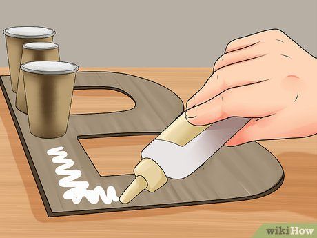 3 Ways to Make 3D Letters - wikiHow Name Standee Diy Letters, 3d Letters Tutorial, 3d Letters Diy, Letters Tutorial, Letter Standee, How To Make Letters, Bullentin Boards, Cardboard Letters, Cardboard Creations