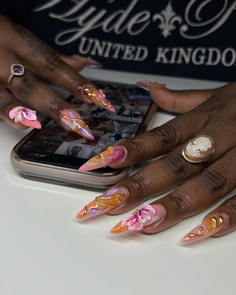 spring meets summer 🌺☀️🌸 inspo: @lilynailsart.co @nuha.nailedit @shopagaloreco products used: *bonding base *rose glow base *goldfish, wine, taffy, pale pink, lavender, iris, coral *bling gel *diamond steel top coat use code ‘ALEXIA10’ at checkout 🤎 #nails #nailart #naildesign #nailsnailsnails #floralnails #flowernails #springnails #summernails #butterflynails #chromenails #3dnailart #3dnails #sculpltedflowers #gelx #gelxnails #gelxinspo #cltnails #cltnailtech Orchid Nails, Glossy Nails, Junk Nails, Lavender Nails, Inspired Nails, Pearl Nails, Pink Lavender, Summer Inspo, Neon Nails