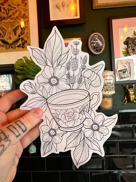 Drawing of a floral teacup with lavender and a bee tattoo design Teacup And Flowers Tattoo, Floral Tea Cup Tattoo, Tattoo Ideas Back Of Leg, Tea Cup Tattoo Ideas, Floral Teacup Tattoo, Teacup Flower Tattoo, Coffee Cup With Flowers Tattoo, Coffee Cup Tattoo Vintage, My Cup Runneth Over Tattoo