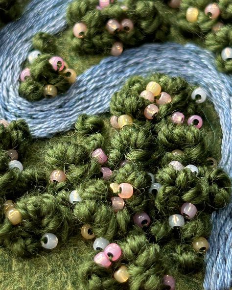 Take a walk through this green felt field and look at the blooming beaded flower bushes ✨ . . . #embroidery #embroidered #needlework #handembroidery #fiberart #fibreart #textileart #dmc #threads #dmcthreads #embroideryartist #embroideryart #aeriallandscape #aerialembroidery #landscapeembroidery #hoopart#freestyleembroidery #embroideryhoopart #handmade #handstitched #smallbusiness #aerialviewart #natureinspired #botanicalembroidery #threadart Flower Bushes, Landscape Embroidery, Embroidery Beading, Thread Art, Fibre Art, Hand Embroidery Art, Slow Stitching, Take A Walk, Embroidery Hoop Art