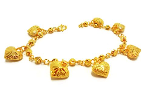 PRICES MAY VARY. Heart Thai Gold Plated, Bangle 22k 24k Thai Baht Yellow Gold Filled Bracelet Jewelry Women All gold plated jewelry was sent directly to us from the manufacturer in Bangkok This Unique Jewelry Is Bronze Coated With Pure Gold Looks Just Like Solid Gold This purity (96.5%) is simply unavailable in the Western World Sourced by us in Bangkok, Thailand. Dimensions: Weight 21 Grams , Length 7.5 inch Yellow Bracelet, Western World, Handcrafted Bracelets, Girl Jewelry, Jewelry Bag, Jewelry Women, Bangkok Thailand, Pure Gold, Jewelry Bags