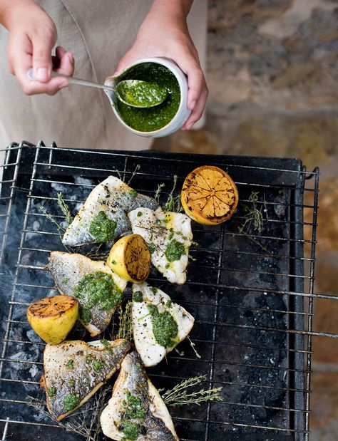 Mojo verde is a Spanish sauce, made from fresh herbs and garlic. In Mallorca I make this barbecued fish with mojo verde with dorada, a local fish, but any firm white fish will do. Make double the quan- tity of mojo verde and enjoy leftovers the next day as a dip or a dressing for salads. Wimbledon Recipes, Spanish Sauce, Family Vegetarian Meals, Mojo Verde, Barbecue Fish, Melissa Hemsley, Gluten Free Bbq, Citrus Fish, Bbq Fish