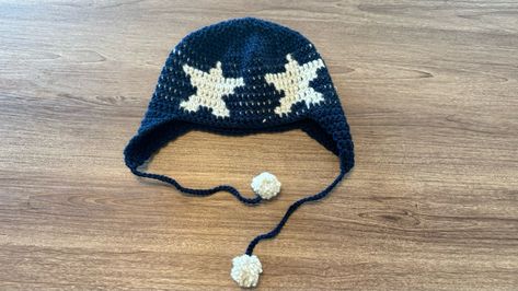 Handmade crochet star beanie with ear flaps Crochet Star Hat Pattern, Crochet Star Hat, Crochet Hat With Ear Flaps, Ear Flap Beanie, Beanie With Ear Flaps, Star Beanie, Star Hat, Beanie With Ears, Hat With Ear Flaps