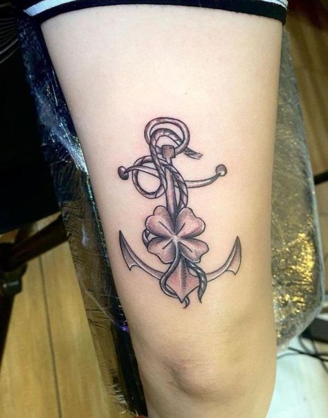 Anchor with Four leaf clover Tattoo black and grey Four Leaf Clover Tattoo Black, Clover Tattoo Black And White, Irish Flag Tattoo, Ripped Skin Tattoo, Shamrock Tattoo, Tattoo Ideas With Meaning, Leaf Clover Tattoo, Meaning Art, Thistle Tattoo