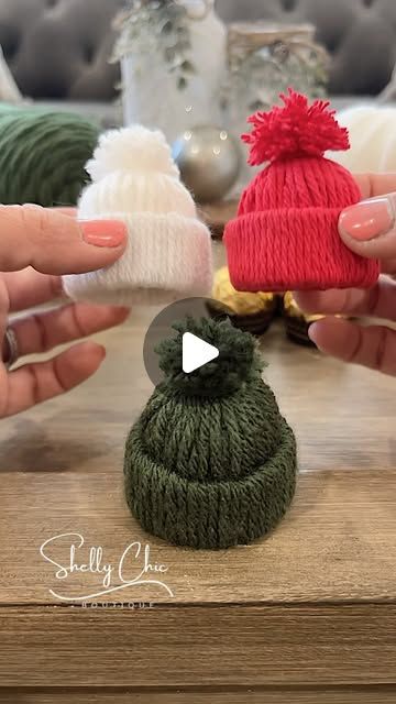 Michelle McRae on Instagram: "DETAILS👇🏼

These mini winter bobble hats make the cutest Christmas craft!  @kira_goode shared them recently and I knew I had to make some in time for this holiday season. 

All you need is yarn and a toilet paper roll. Pop a ball of chocolate inside and they would make great stocking stuffers, holiday party favors or adorable Christmas tree ornaments. 🌲" Christmas Craft Gnomes, Yarn Toilet Paper Roll Hat, Stocking Cap Ornament, Stocking Hat Ornament, Toilet Roll Hats, Winter Hat Ornaments Diy, Mini Yarn Hat Ornaments, Mini Christmas Stocking Ideas, Yarn Hats With Toilet Paper Rolls