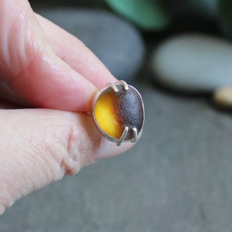 A funky Seaham sea glass ring…the perfect gift for the beach lover in your life! Size 6 1/4 #seaham #seahamseaglass #seaglassjewelry #seaglass #seaglassaddict #seaglassring #etsy #etsyhandmade #etsyjewelry #etsypromote Sea Glass Ring, Glass Ring, Beach Lover, April 21, Glass Rings, Beach Lovers, Sea Glass Jewelry, Etsy Jewelry, Life Size