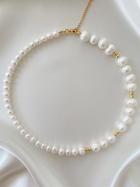 So simple, so clean. Make your choker dreams come true with this stunning pearl piece. Featuring 14K gold beads hand strung alongside genuine freshwater pearls, the 'CAPRI' necklace will have all eyes on you. Wear on its own, or stack with our 'FAI' chain to instantly dress up any look! Made with 14K gold filled beads and genuine AAA-grade freshwater pearls. Available in lengths 14", 15", 16", 18", 20". All lengths include a 2" extension chain. Model is wearing 16". Handmade in Los Angeles. Lavender Butterfly, Multi Pendant, Jewelry Accessories Ideas, Gold Bead Necklace, Bead Work Jewelry, Handmade Ideas, Freshwater Pearl Necklace, Pearl Strands, 925 Sterling Silver Chain