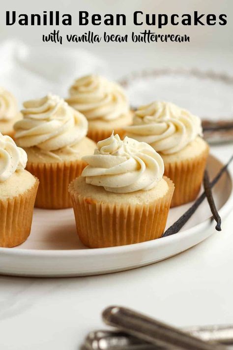 Vanilla Bean Cupcakes are moist and full of vanilla bean flavor in both the cupcake and the delicious buttercream. These cupcakes will be the star of the party, and you can tailor the vanilla buttercream color for any occasion too! Easy Vanilla Cupcake Recipe, Buttermilk Cupcakes, Buttercream Color, Easy Vanilla Cupcakes, Cupcake Recipes From Scratch, Vanilla Bean Buttercream, Vanilla Bean Cupcakes, Vanilla Cupcake Recipe, Gourmet Cupcakes