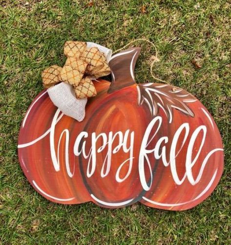 10 DIY Wooden Pumpkin Ideas You'll Love For Fall - Society19 Pumpkin Signs Wooden Painted, Wood Pumpkin Painting Ideas, Pumpkin Diy Decor, Pumpkin Signs, Pumpkin Cutouts, Pumpkin Diy, Fall Wood Crafts, Fall Door Hanger, Pumpkin Door Hanger