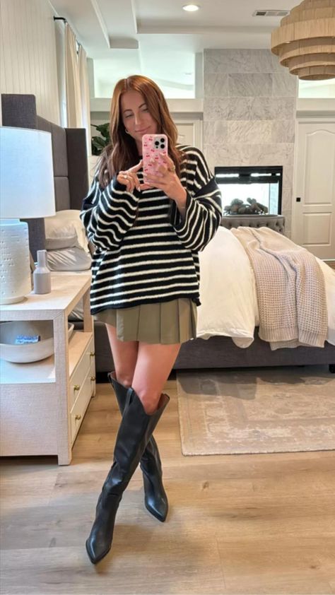 This is the perfect fall outfit IMO!! Black knee high boots + a pleated skirt with a sweater...it screams fall!  Get this preppy fall outfit here & follow for more cute fall outfit ideas, early fall outfit inspo & aesthetic fall outfits 2024. Sweater With Pleated Skirt, Sweater Outfits Skirt, Bow Sweater Outfit, Trendy Mom Outfits Fall, Black Leggings Outfit Fall, Concert Outfit Fall, Mom Outfits Fall, Skirt Outfit Fall, Leggings Outfit Fall