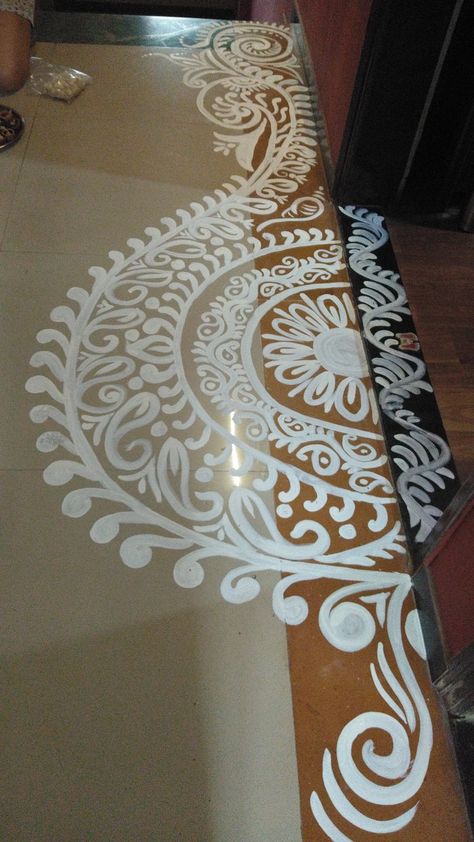 Fabric Rangoli Designs, White Paint Rangoli Designs On Floor, Half Circle Alpona Design, White Paint Rangoli, Alpana Designs Bengali Laxmi Puja, Lokhi Puja Alpona, Jhuti Designs, Alpana Designs Bengali Border, Alpona Design Bengali Border