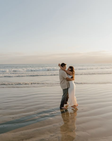 The ocean always makes for the prettiest prop. You can never go wrong with engagement photos on the beach 🌊 #engagementphotos #beachengagementphotos #sandiego Beach Pictures Poses Couples Engagement Photography, Engagement Ocean Photos, Sunrise Beach Engagement Photoshoot, Beach Engagement Session, Ocean Engagement Pictures, Fall Beach Engagement Photos, Coastal Engagement Photos, Engagement Photos On The Beach, Engagement Pictures Beach