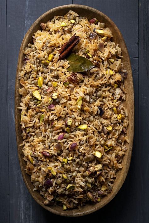 Lebanese Rice and Lentil Pilaf (Mujadara) – Vegan This rice and lentil pilaf is an easy and wholesome recipe based on the traditional Lebanese Mujadara. Some added spices, raisins and nuts make it warm and cozy.  #lebanese #healthy #rice #pilaf #mujadara #vegan #jeweled #lentil #spices #onions Lentils And Rice Recipe, Lentil Pilaf, Mujadara Recipe, Lebanese Rice, Arabisk Mad, Pilaf Recipe, Pilaf Recipes, Healthy Rice, Lentils And Rice