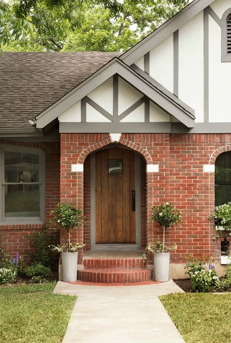 Brick Tudor exterior. Come get inspired by Tranquil and Timeless Tudor Design Details From a Serene 1920s Texas Cottage renovated on HGTV's Fixer Upper by Chip and Joanna and known as the Scrivano House. #fixerupper #scrivano #tudorcottage #cottageexterior #homeexteriors Tudor Exterior Paint, Tudor House Exterior, Tudor Design, Tudor Cottage, Tudor Style Homes, Cottage Exterior, Red Brick House, Brick Exterior House, Tudor House