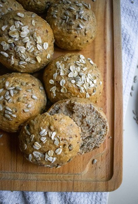 Whole Grain rolls on a cutting board; one roll is cut in half to display the interior structure of the roll. Types Of Seeds, Whole Wheat Rolls, Bread Rolls Recipe, Grain Bread, Scandinavian Food, Flax Seeds, Quick Bite, Whole Grain Bread, Food Dessert