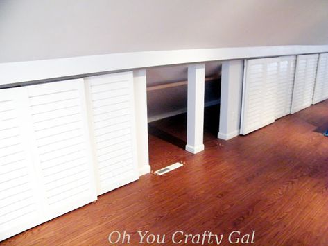 Attic knee wall hanging closet with custom sliding doors Oh You Crafty Gal Attic Sliding Door Storage, Knee Wall Storage Doors, Attic Sliding Doors, Craft Room Attic, Room Attic, Knee Walls, Attic Bedroom Storage, Custom Sliding Doors, Slanted Walls