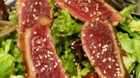 Fresh tuna steaks are first rubbed with a bold blend of spices, then seared to a delicious medium-rare. Marinated Tuna Steak, Seared Tuna Steaks, Ahi Tuna Steak, Tuna Steak Recipes, Delicious Salad Dressings, Tuna Steak, Seared Ahi, Yummy Salads, Fresh Tuna