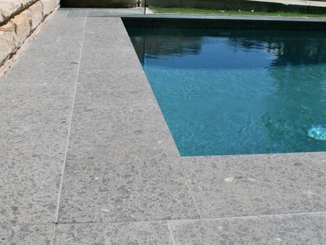 Eco Outdoor Torino granite pool coping. Eco Outdoor | Contemporary Pools | Granite paving | livelifeoutdoors | Outdoor Design | Natural stone flooring | Garden design | Outdoor paving | Outdoor design inspiration | Outdoor style | Outdoor ideas | Paving ideas | Garden ideas | Natural stone paving | Floor tiles | Outdoor tiles | Pool ideas Amphitheatre Design, Pool Tiles Ideas, Pool Coping Ideas, Pool Flooring, Pool Deck Pavers, Swimming Pools Ideas, Bali Houses, Grey Pool, Deck Pavers