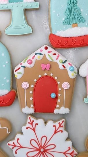 A few of my favorite Christmas cookies - gingerbread houses, cake stands, snow globes, and anything pink! I used Sweet Sugarbelle's shape shifter pocket cutter for this gingerbread house. #gingerbreadcookies #gingerbreadchristmas #christmascookies #christmasdecoratedcookies #bakinggrandma #gingerbreadhouse @acfoodcrafting @sweetsugarbelle | Heidi Thurston | Percy Faith & His Orchestra · My Favorite Things Gingerbread House Sugar Cookies, House Sugar Cookies, Favorite Christmas Cookies, Anything Pink, Sweet Sugarbelle, Cookies Gingerbread, Holiday Baby Shower, Icing Techniques, Shape Shifter