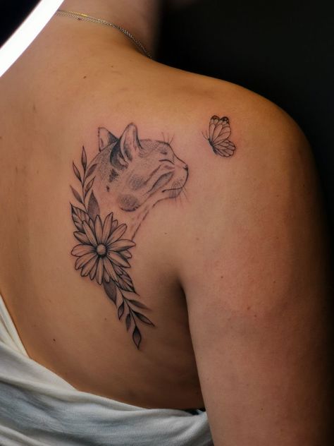 Cat memorial tattoo, with flowwr and butterflies Kitten Memorial Tattoo, Cat Shoulder Tattoo, Cat Name Tattoo, Dead Cat Tattoo, Tattoos For Cats That Passed, Pet Memorial Tattoo Cat, Angel Cat Tattoo, Cat Remembrance Tattoo, Cat Memorial Tattoo