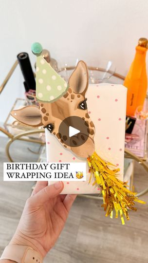 1.2M views · 67K reactions | YOU’RE NOT READY FOR HOW CUTE! 🥳🎁🦒  Comment ZHUZH for the animal garland & everything else I used to wrap this gift!   This is a new way to use the cute party horns for gift wrapping! Just grab a cute animal garland / cutout and add the blower using hot glue or foam tape to secure it   The garland came with 20 die cut animals and the party horns come in a pack of 6 so you can easily rinse and repeat this same method for a bunch of gifts!   I also ended up adding some letter beads to the top right corner for the name which made it even cuter  An easy way to create a Pinterest-esque gift! ✨  What should we name him?!?  #birthday #birthdaygifts #bdaygift #birthdaygiftideas #giftwrappingideas #giftwrapping #giftwrappinginspiration #giftwrappinginspo #birthdaygif Animal Wrapping Ideas, Unicorn Gift Wrapping Ideas, Stuffed Animal Gift Wrapping Ideas, Fun Ways To Wrap Birthday Gifts, First Birthday Wrapping Ideas, Fun Gift Wrapping Ideas Birthdays, Fun Birthday Wrapping Ideas, 1st Birthday Gift Wrapping Ideas, Animal Gift Wrapping Ideas