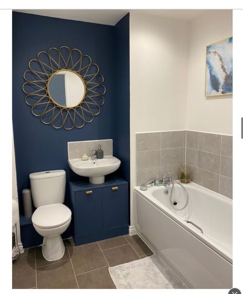 Tiny Bathroom Makeovers, Navy And Gold Bathroom, Blue Accent Wall Ideas, Navy Blue Accent Wall, Blue Small Bathrooms, Tiny Bathroom Makeover, Blue Accent Wall, Blue Bathroom Walls, Dark Blue Bathrooms