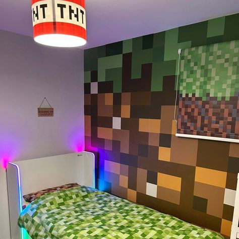 Kim Harper - "Minecraft bedroom mural wall project 💚🟩⬜️🟫 I couldn’t find any wallpaper or murals online that fit with the Minecraft theme so we decided to paint one ourselves square by square using Valspar paint and yellow frog tape and here is the finished project……." Blind - Toffie Design Bedding, sign and lampshade - eBay Bed - x rocker All paint is Valspar , in the following colours: Wise Grasshopper Veranda View Shepherds Green Privet Hedge Gingerbread Brick Bronze Storm Aged Cognac B... Wall Mural Diy, Privet Hedge, Mural Diy, Minecraft Wall, Bedroom Mural, Minecraft Theme, Wall Murals Diy, Valspar Paint, Minecraft Bedroom