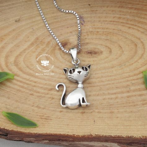 "Unusual Cat pendant necklace, Small funny cat jewelry, Cat gift, Cat lovers idea, Kitty jewelry, 925 sterling silver, Cat accessories, Novelty cat necklace, Remembrance gift 925 Sterling Silver Cat pendant! *Beautiful to wear it... for all Cats Lovers* Average weight: 1.6 g Length: 2.5 cm Width: 1.5 cm SHIPPING: We use Standard International Air Mail ** 7-10 working days for EUROPE and 7-20 working days WORLDWIDE For UK we use 2o Class \"Signed For\" 3-5 working days. If you want faster deliver Big Eye Cat, Silver Cat Pendant, Crazy Cat Lady Gifts, Cat Pendant Necklace, Necklace Big, Sterling Silver Cat, Cat Pendant, Remembrance Gifts, Silver Cat