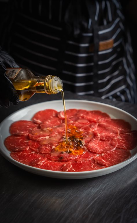 Dive into Carpaccio Perfection at JZ Steakhouse! 🌟 Savor thinly sliced beef, adorned with fresh olive oil. Join us and elevate your dining experience! #JZSteakhouse #Carpaccio #FreshFlavors Fresh Olives, Dining Experiences