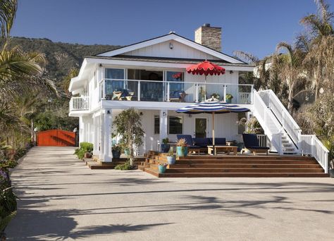 Ashton Kutcher and Mila Kunis Buy $10 Million Home in Santa Barbara | Architectural Digest Beach House Outside, Mila Kunis Ashton, Mila Kunis And Ashton Kutcher, Mila Kunis Ashton Kutcher, Cottage Lounge, Second Floor Balcony, California Beach House, Santa Barbara Beach, Beachfront Decor