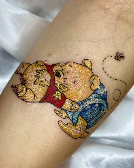 Glitter tattoos are body art that are created using a stencil and special glue to apply glitter to the skin. They are a popular form of body art, espe... Pooh Bear Tattoo, Winnie The Pooh Tattoo, Tattoo Ink Colors, Sparkle Tattoo, Retro Tattoos, Wild Tattoo, Pokemon Tattoo, Tattoo Templates, Glitter Tattoo