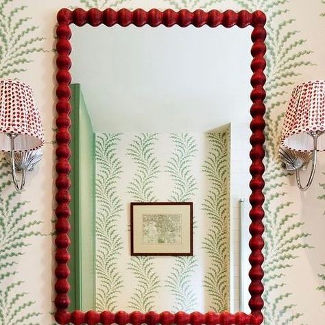 Alfred Newall on Instagram: "Cheerful red bobbin mirror in beautiful bathroom by @thenookinteriordesign   In good company with @soanebritain wallpaper @jimlawrencemade lighting @mollymahonblockprinting lampshades.  Photo: @the_london_gentleman" Bath Mirror, In Good Company, Power Room, March 16, Beautiful Bathrooms, Good Company, Lampshades, Interior Decor, Interior Decorating