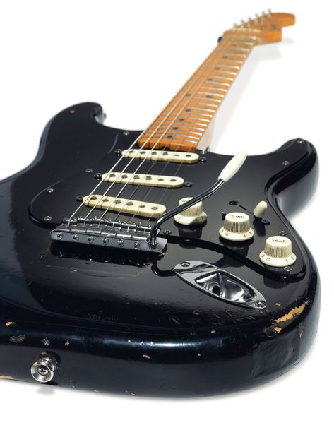 'The Black Strat’: The story of David Gilmour’s iconic guitar | Christie's David Gilmour Black Stratocaster, Black Stratocaster David Gilmour, Black Stratocaster, David Gilmour Guitar, Painted Guitars, Painted Guitar, Pink Floyd Albums, Story Of David, Rock And Roll History