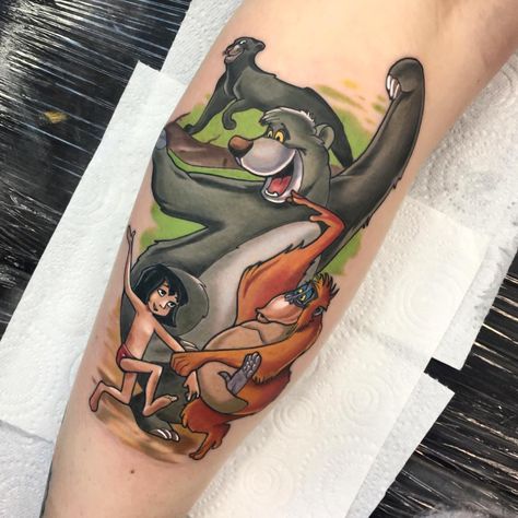 Jordan Baker 🇬🇧 on Instagram: “Such a fun day on this jungle book piece for Charlotte! Thanks for the trust 🙏🙌🏼 proudly sponsored by @pennyblack.tattoo using @fusion_ink…” The Jungle Book Tattoo, Book Tattoo Simple, Baloo Tattoo, Jungle Book Tattoo, Tattoo Ink Colors, Jungle Tattoo, Jordan Baker, Fusion Ink, Disney Tattoo